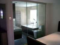 Bespoke glass door & partition between bedroom and en-suite in Barnet