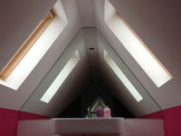 Triangular mirror in a Harpenden en-suite